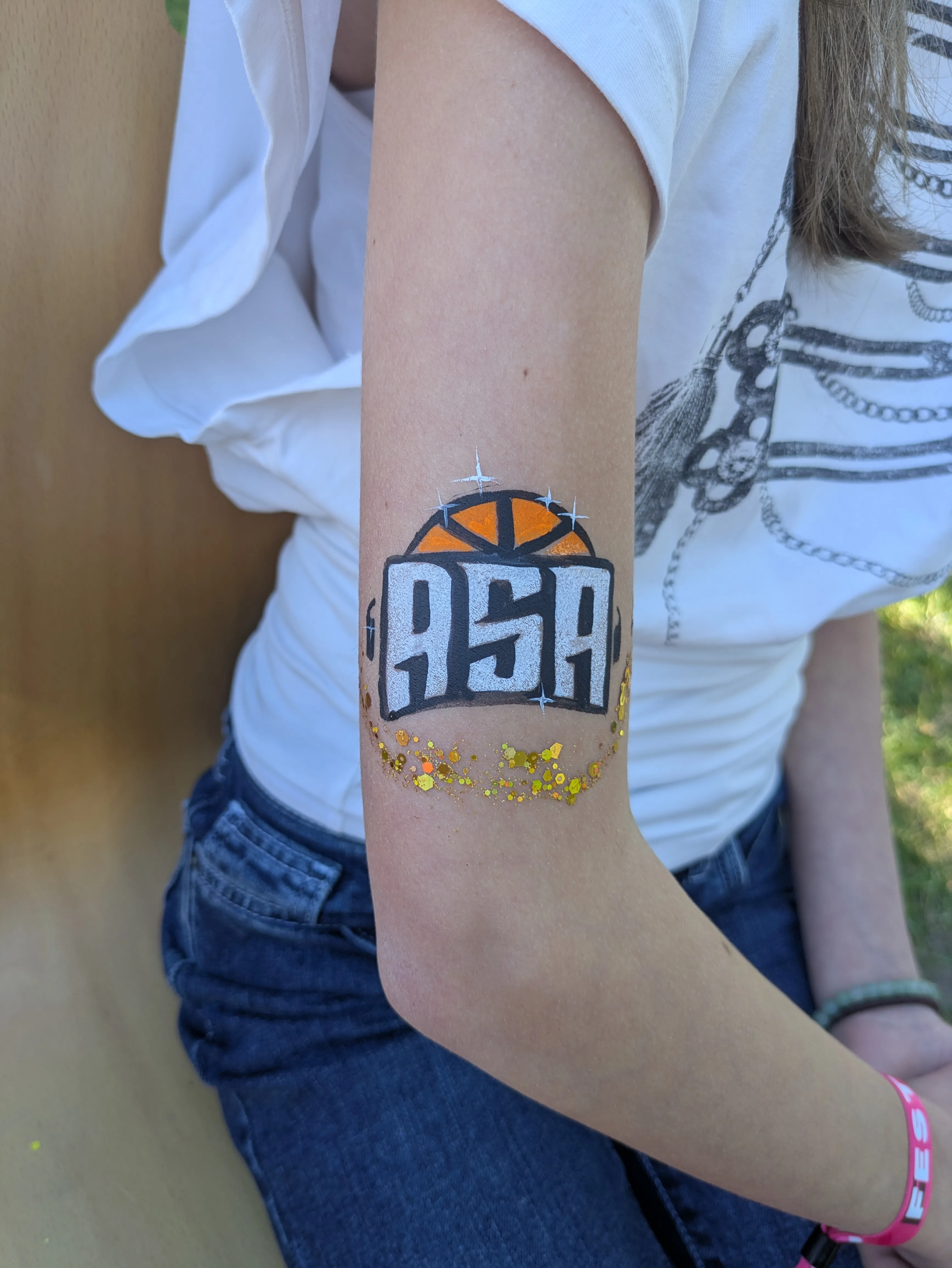 Logo sportif ASA réalisé en maquillage artistique